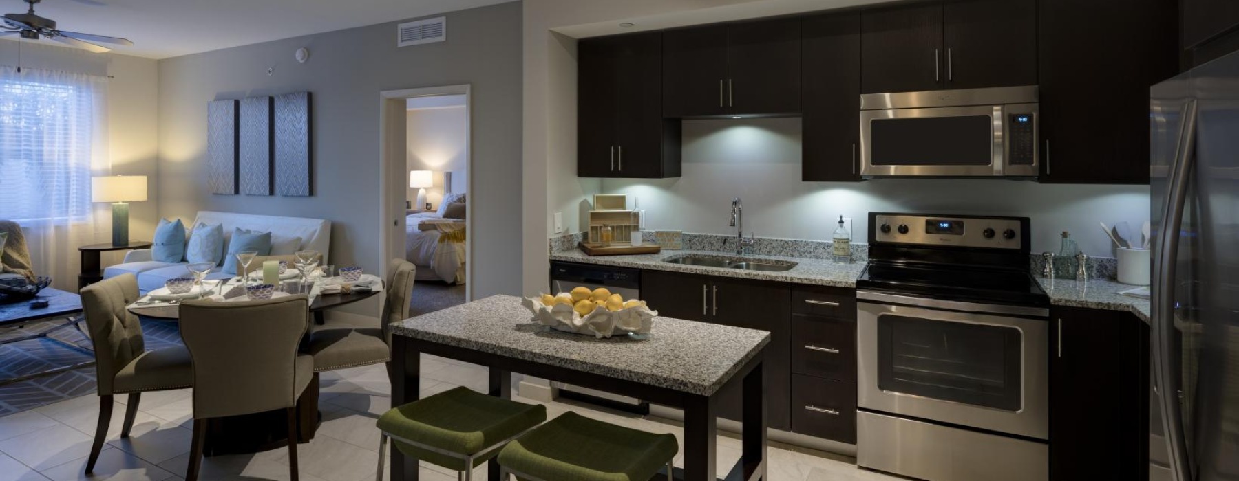 a kitchen with a table and chairs